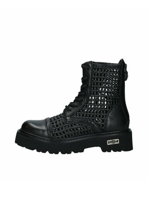 Stivaletti con plateau - nero