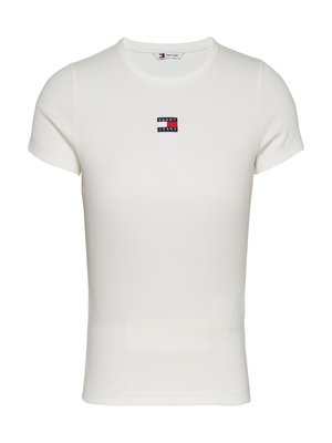White short-sleeve T-shirt made of ribbed fabric. Features a small black and red logo patch at the chest. Round neckline.