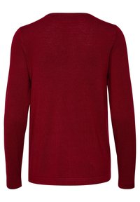 Framboosrode trui met lange mouwen en ronde hals. Gebreide textuur, geribbelde manchetten en zoom. Eenvoudig, onversierd ontwerp aan de achterkant.