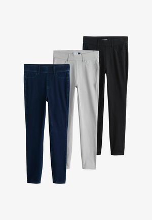 Kolm paari kitsaid pükse: tumesinine, helehall ja must. Igal paaril on sile pind, esitaskud ja vöökoht.