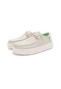 Gray fabric slip-on shoes with a textured surface, featuring light beige laces, a cushioned white sole, and a colorful patterned interior.
