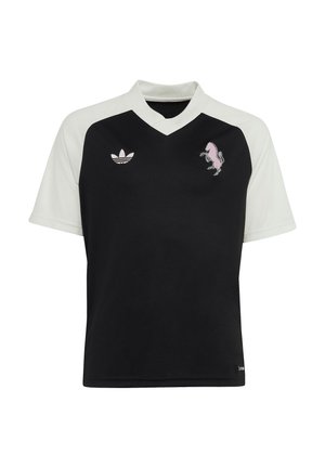 Krótki czarno-biały sportowy jersey z białym kołnierzem, logo Adidas na lewej piersi i pikselowanym emblematem jednorożca na prawej piersi.