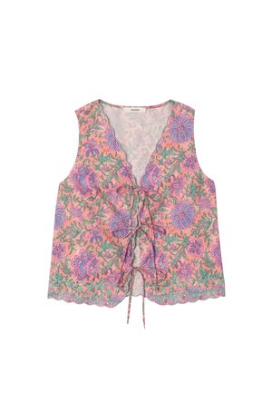 Blouse rose sans manches avec motif floral violet, col en V et trois fermetures à nouer à l'avant, détail ourlet festonné.