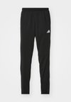 3 STRIPES - Tracksuit bottoms - black