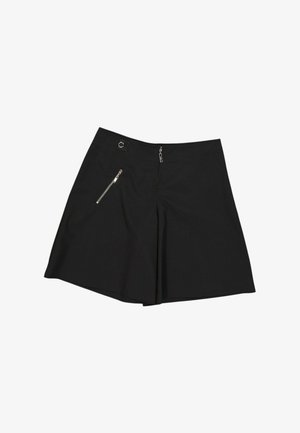Jupe noire trapèze avec fermeture éclair sur le devant et une poche zippée diagonale sur le côté gauche.