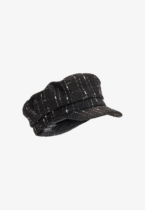 Casquette gavroche en tissu noir texturé avec des rayures blanches tachetées et une courte visière incurvée.