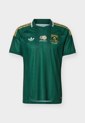 Green South African Football Association jersey with gold stripes on shoulders and logos on chest, featuring subtle vertical patterns.