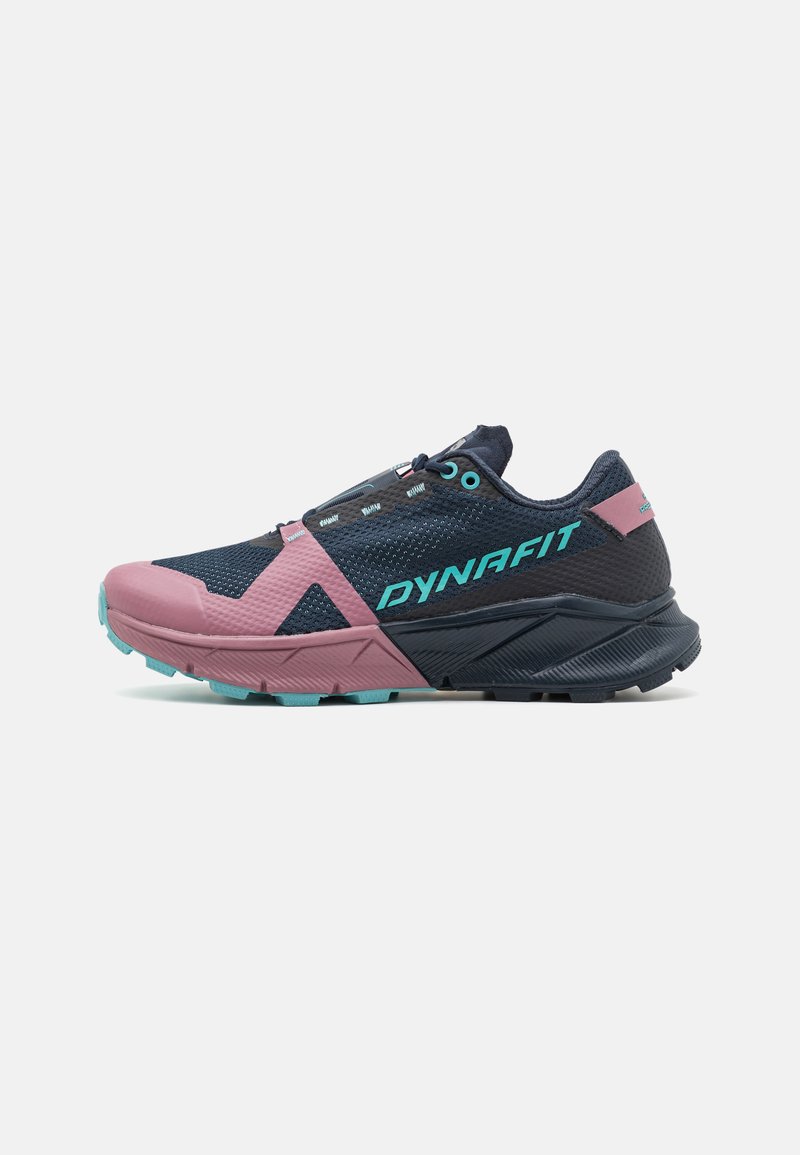 Dynafit running shoe featuring a navy mesh upper, pink and turquoise accents, a textured sole, and a secure lace-up design.