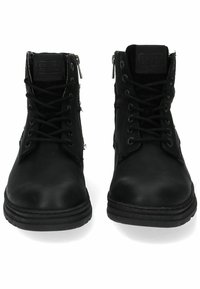 Bottes noires jusqu'à la cheville avec une finition en cuir lisse, dotées d'un laçage, d'œillets en métal et de fermetures éclair sur les côtés pour un accès facile.
