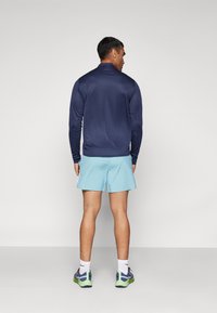 Nike Performance CHALLENGER - Sportske kratke hlače - denim turquoise/glacier blue/black