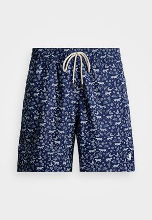 Bañadores de marina con un estampado de animales y follaje en blanco por toda la prenda, cinturilla elástica con cordón y tela ligera y texturada.