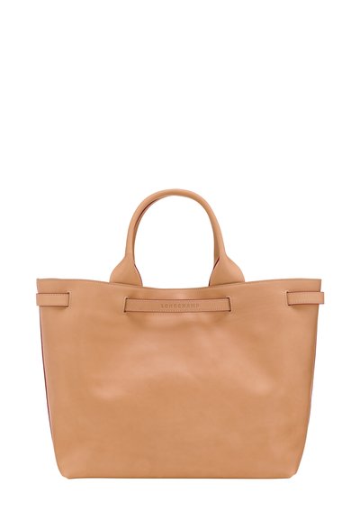Tan leather tote bag with two handles, flat design, subtle branding on front, smooth texture, and an open top. No closure visible.