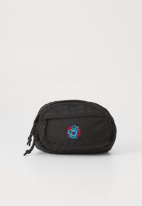 Saco de nylon preto com dois compartimentos com fechos de correr, apresentando um design bordado em azul e vermelho de uma mão na parte da frente. Superfície texturizada.
