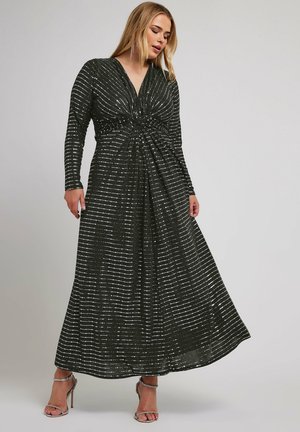 Zwarte maxi-jurk met lange mouwen, V-hals, gathers in de taille en zilveren pailletten horizontale strepen. Doorzichtige stof met een vloeiende silhouet.