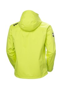 Chubasquero amarillo brillante e impermeable con capucha, con una textura suave y un logo en el hombro izquierdo. Diseño minimalista sin acentos notables.