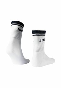 Hvide crew sokker med marineblå striber og tekst. Ribbet design ved kanten, glat tekstur og mellemhøjde. Velegnet til afslappet brug.