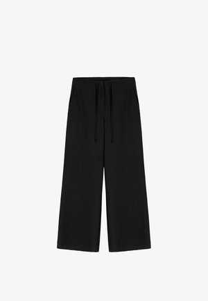 Black wide-leg pants with a drawstring waist and side pockets, displayed flat against a plain background.