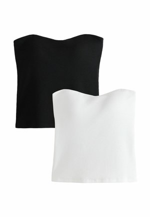 Due top a tubo senza spalline a coste, uno nero e uno bianco, esposti su sfondo bianco.
