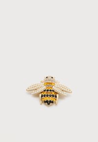 Sélectionné, giallo