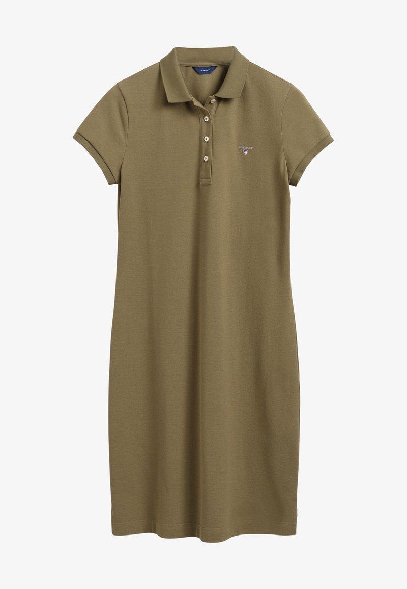 Olivově zelené polo šaty vyrobené z bavlny, s límečkem, krátkými rukávy, předním zapínáním na tři knoflíky a vyšitým logem na hrudi.