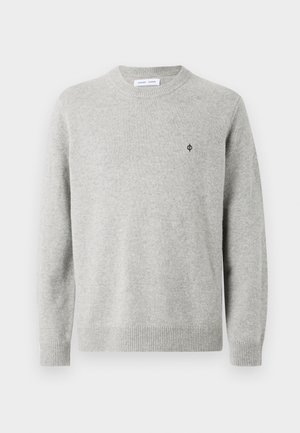 Light gray knit sweater with a rounded neck, long sleeves, ribbed cuffs and hem, featuring a small black logo on the chest.
