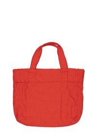 Borsa tote rossa trapuntata con doppie maniglie robuste, caratterizzata da una texture morbida e da decorazioni a motivi arrotondati all'esterno.
