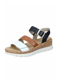Sandal à semelle compensée avec des sangles noires, marron et blanches. Présente une plateforme en liege et une boucle ajustable pour le confort et le soutien.