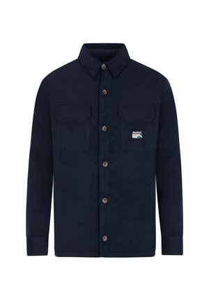 Námornícko modrá mikina s dlhými rukávmi, dvoma náprsními vreckami, zapínaním na gombíky a malou nášivkou vľavo na vrecku.