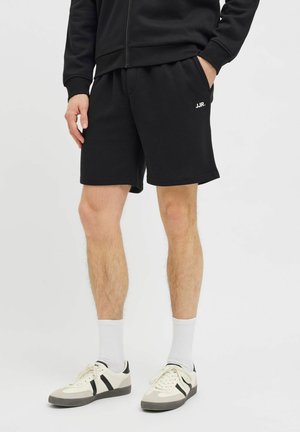 REGULAR FIT - Tepláky - black