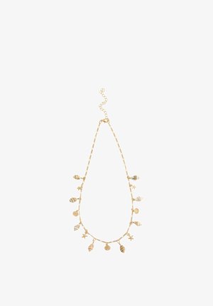Gold necklace featuring a chain with various hanging charms, including stars and seashells. Delicate design with textured accents.