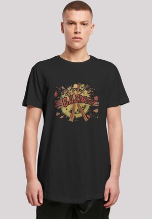 Black cotton t-shirt featuring a comic-style "BAZINGA!" graphic in bold red on a yellow burst background, with a relaxed fit and short sleeves.