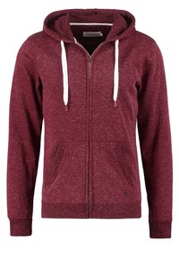 Bordeauxrode hoodie met ritssluiting, witte trekkoorden, twee voorzakken en geribbelde zoom en manchetten. Gemaakt van gestructureerde stof met een gemêleerde afwerking.