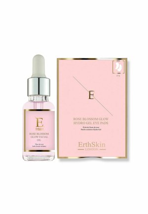Butelka olejku do twarzy Rose Blossom Glow z zakraplaczem obok różowo-złotego opakowania płatków pod oczy Rose Blossom Glow Hydro Gel marki ErthSkin.