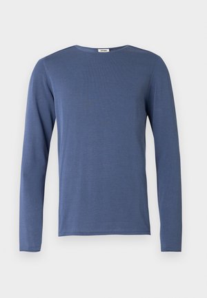 Long-sleeve, crew-neck shirt in medium blue. Made of soft fabric with a subtle texture. Straight cut and minimal detailing.