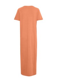 Robe à manches courtes, longueur cheville, dans une couleur pêche unie. Fabriquée à partir d'un tissu lisse avec une coupe décontractée et un col rond. Sans embellissements.