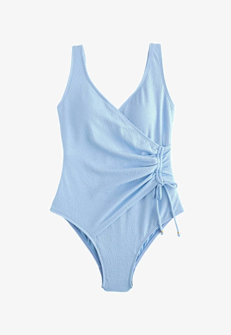 Hellblauer Einteiler mit strukturiertem Stoff, V-Ausschnitt und verstellbarem seitlichem Rüschen-Schnürungsdetail.