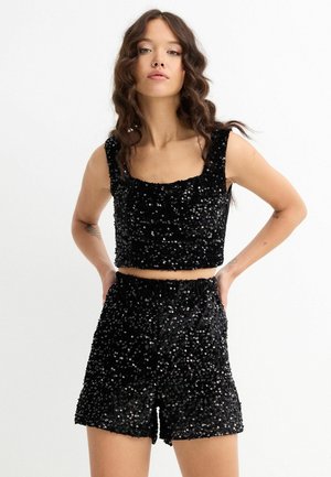 DE LENTEJUELAS - Shorts - black