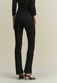 Next Džíny Bootcut - black