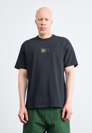 Nike Sportswear TEE SEGA - T-shirts - black