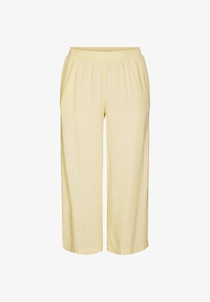 Pantaloni corti giallo chiaro a vestibilità ampia con vita elastica e tasche laterali.