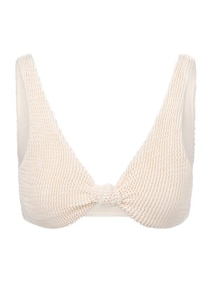 Top de bikini color beige claro con textura acanalada, diseño de escote en V profundo, tirantes anchos y detalle de nudo en el centro.