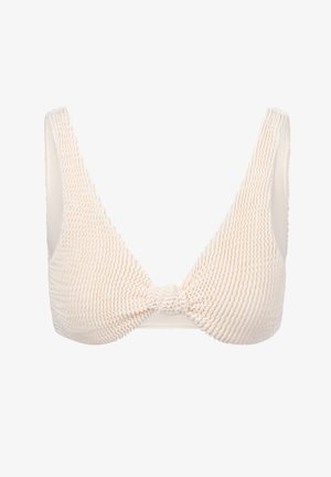 Lys beige bikini top med ribbet tekstur, dyb V-udskæring, brede skulderstropper og en knude detalje i midten.