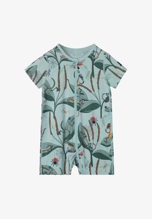 Korte mouw jumpsuit van lichtblauwe stof met een rits. Kenmerkt zich door een speelse print van planten en insecten, waaronder kikkers, insecten en spinnen.