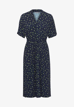 Mörkblå klänning med korta ärmar och V-ringning, prydd med ett blommönster i grönt. Midjan är åtdragen med ett matchande knytbälte.