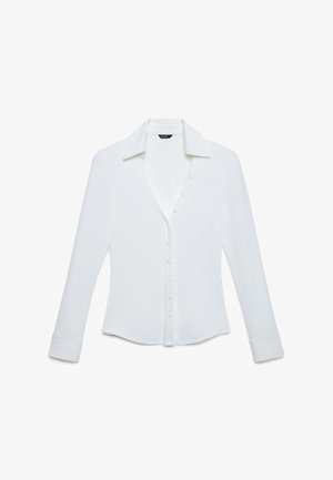 Weißes, langärmliges Hemd mit Knopfleiste, gekerbtem Kragen, glatter Textur und sieben Knöpfen vorne. Leicht gebogter Saum am unteren Rand.