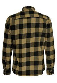 Camicia di flanella a maniche lunghe con grande motivo a quadri neri e beige, mostrata dal retro con polsini abbottonati e orlo dritto.