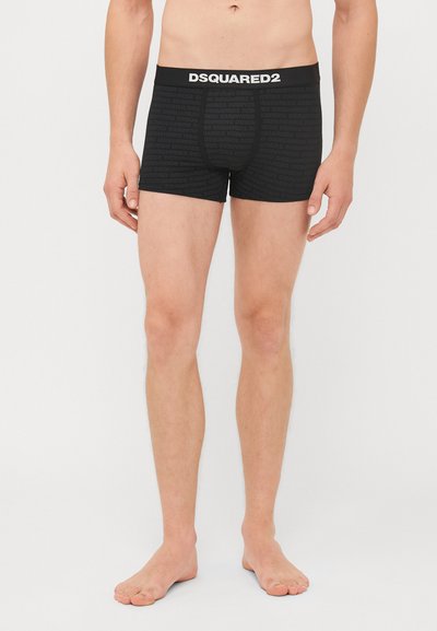 Schwarze Boxershorts mit wiederholtem Logo-Muster, elastischem Bund mit "DSQUARED2"-Markierung, eng anliegendem Schnitt und weichem Material.