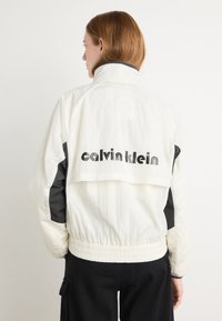 Calvin Klein Jeans RETRO TRACK JACKET - Training jacket - tofu