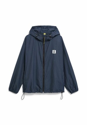 Veste à capuche bleu marine à carreaux avec fermeture éclair frontale, poignets élastiques, cordons de serrage réglables à l'ourlet, et un petit écusson logo blanc sur la poitrine.