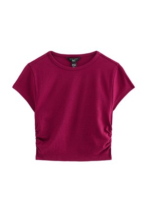 Kort mouw crop top in diep magenta met ronde hals en gerimpelde zijkant, maat 12-13 jaar.